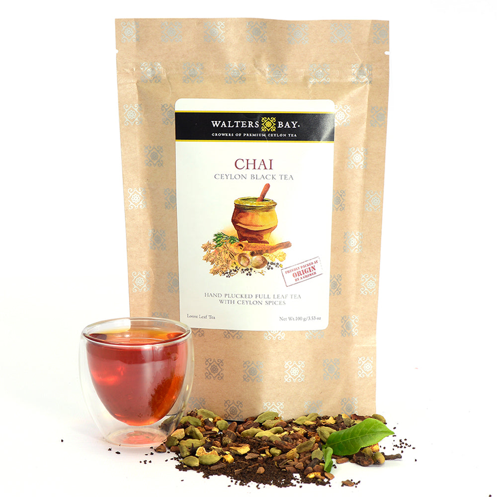 Walters Bay Chai Loose Leaf Tea pouch with loose tea and a cup.