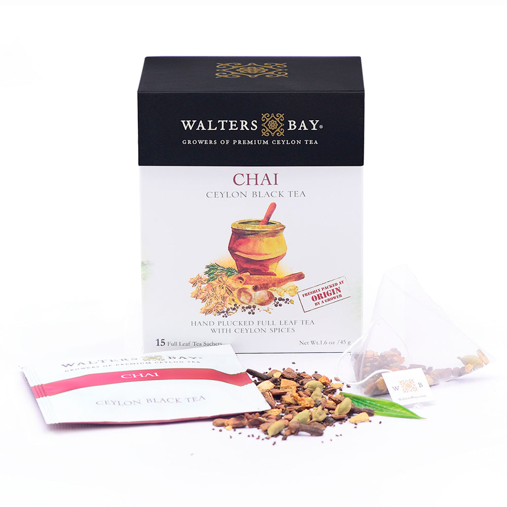 Walters Bay Chai Tea in a fliptop box with loose tea, a tea envelope, and a pyramid tea bag.